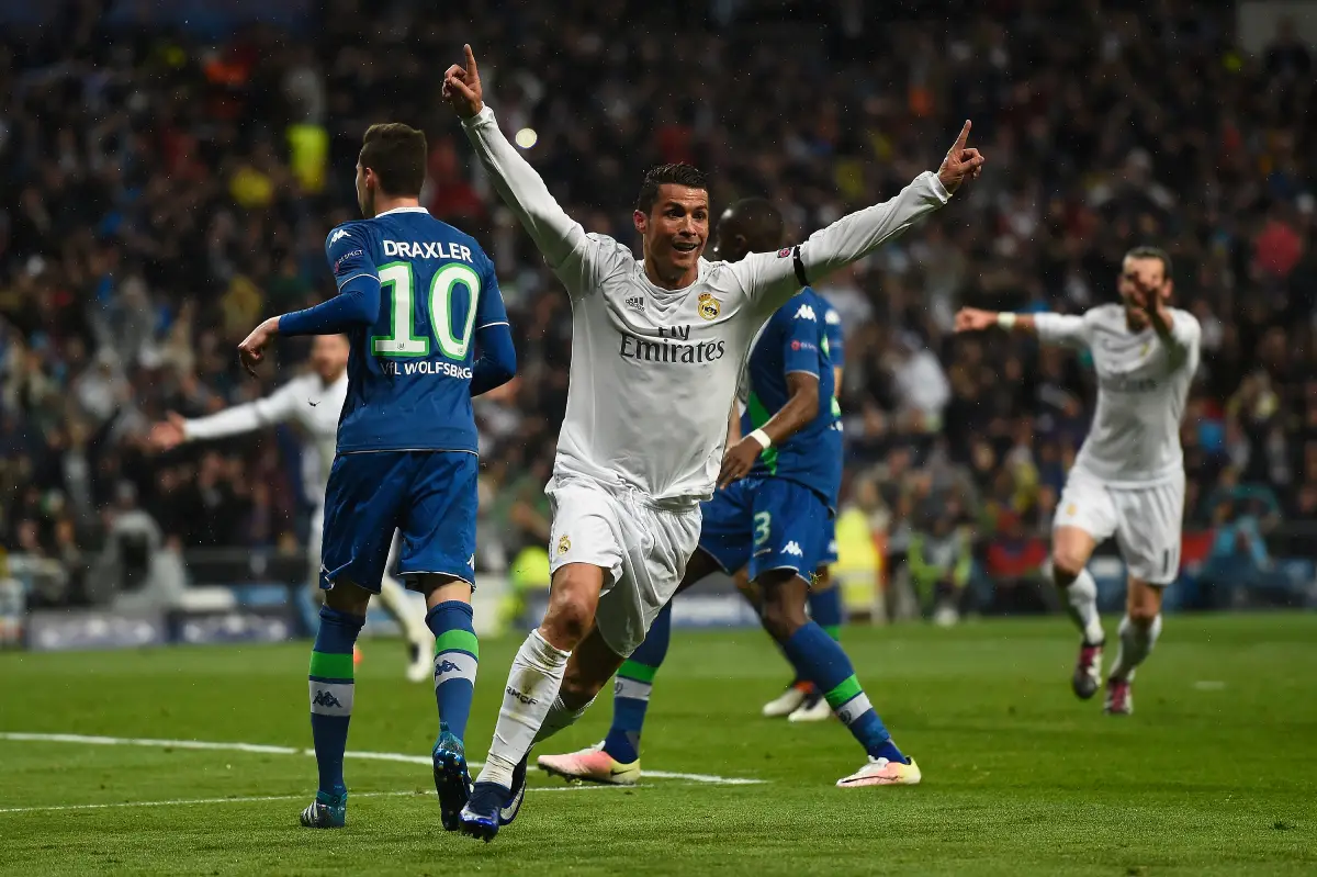 MADRID, SPAIN - APRIL 12: Cristiano Ronaldo of Real Madrid celebrates his second goal during the UEFA Champions League quarter final second leg match between Real Madrid CF and VfL Wolfsburg at Estadio Santiago Bernabeu on April 12, 2016 in Madrid, Spain. (Photo by Mike Hewitt/Getty Images)