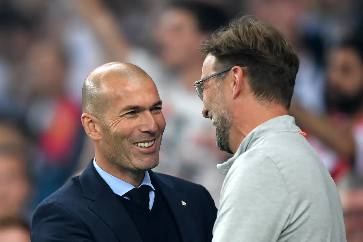 KIEV, UKRAINE - MAY 26: Zinedine Zidane, Manager of Real Madrid greets Jurgen Klopp, Manager of Liverpool prior to the UEFA Champions League Final between Real Madrid and Liverpool at NSC Olimpiyskiy Stadium on May 26, 2018 in Kiev, Ukraine. (Photo by Shaun Botterill/Getty Images)