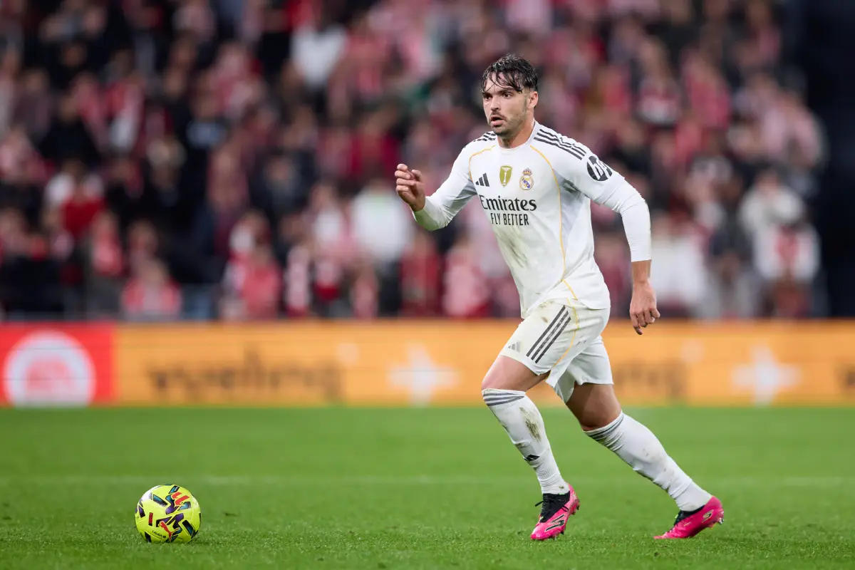 BILBAO, SPAIN - DECEMBER 03: Raul Asencio of Real Madrid CF carries the ball during the LaLiga EA Sports match between Athletic Club and Real Madrid CF at Estadio de San Mames on December 03, 2025 in Bilbao, Spain. (Photo by Ion Alcoba Beitia/Getty Images)