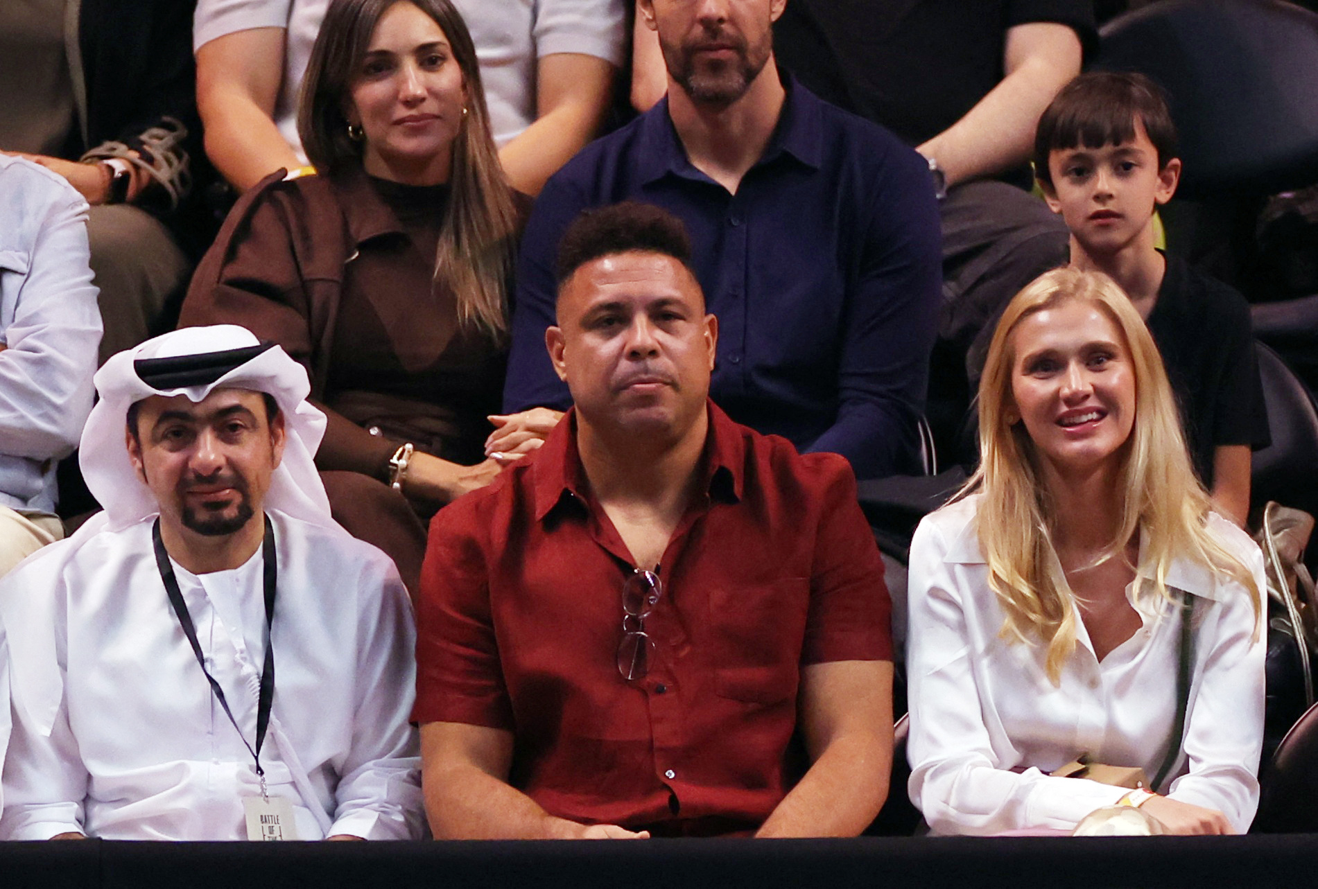 DUBAI, UNITED ARAB EMIRATES - DECEMBER 28: Former footballer Ronaldo and his partner Celina Locks look on during the Battle of the Sexes match between Aryna Sabalenka and Nick Kyrgios of Australia at Coca-Cola Arena on December 28, 2025 in Dubai, United Arab Emirates. (Photo by Amr Alfiky - Pool / Getty Images)