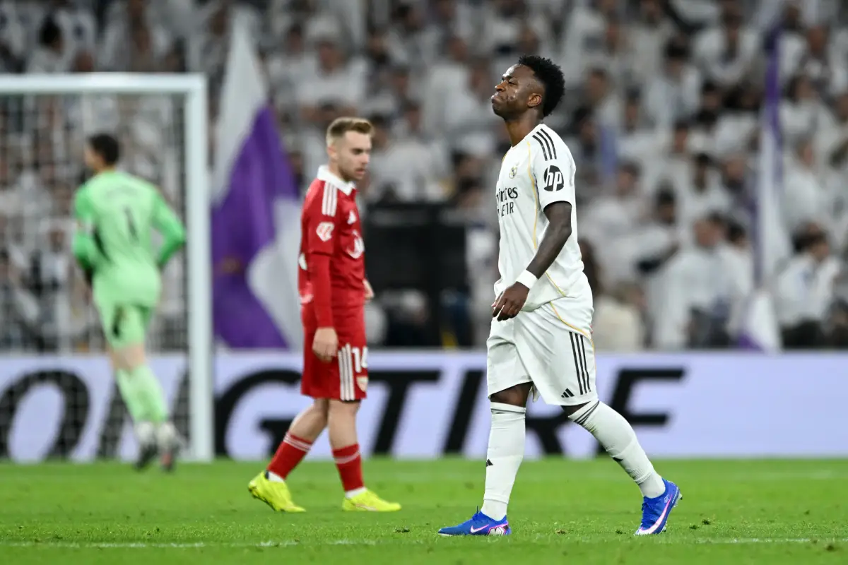 MADRID, SPAIN - DECEMBER 20: Vinicius Junior of Real Madrid reacts as he walks off the pitch to be substituted for Gonzalo Garcia (not pictured) during the LaLiga EA Sports match between Real Madrid CF and Sevilla FC at Estadio Santiago Bernabeu on December 20, 2025 in Madrid, Spain. (Photo by Denis Doyle/Getty Images)