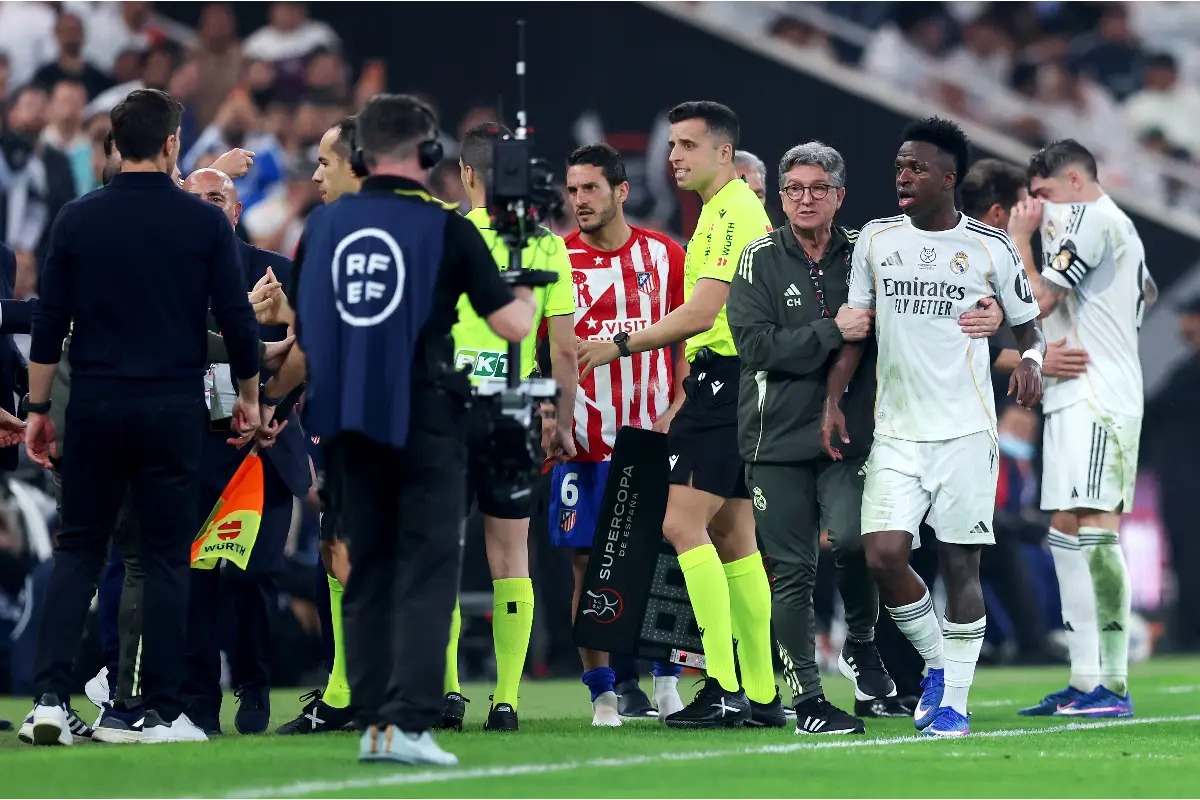 JEDDAH, SAUDI ARABIA - JANUARY 08: Vinicius Jr of Real Madrid is The LED board shows the away during the Spanish Super Cup Semi-Final match between Real Madrid and Atletico Madrid at King Abdullah Sports City Hall Stadium on January 08, 2026 in Jeddah, Saudi Arabia. (Photo by Yasser Bakhsh/Getty Images)
