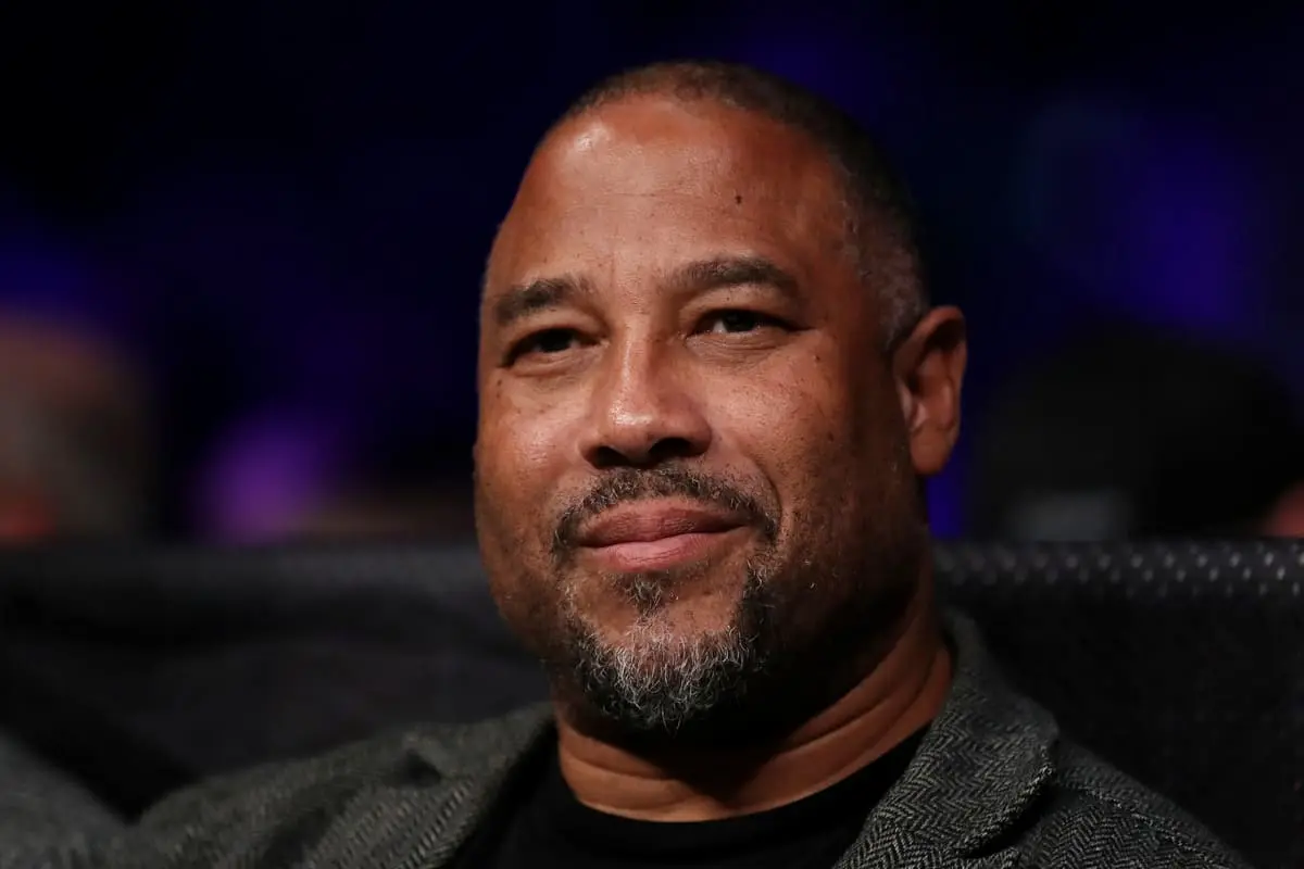 LIVERPOOL, ENGLAND - NOVEMBER 06: Former Footballer John Barnes watches on during the Boxxer Series fight night at M&S Bank Arena on November 06, 2021 in Liverpool, England. (Photo by Lewis Storey/Getty Images).