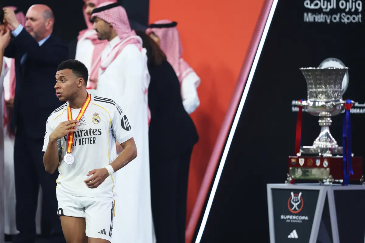 JEDDAH, SAUDI ARABIA - JANUARY 11: Kylian Mbappe of Real Madrid is pictured with their runners up medal walking away from the Spanish Super Cup following the Spanish Super Cup Final between FC Barcelona and Real Madrid at King Abdullah Sports City Hall Stadium on January 11, 2026 in Jeddah, Saudi Arabia. (Photo by Yasser Bakhsh/Getty Images)