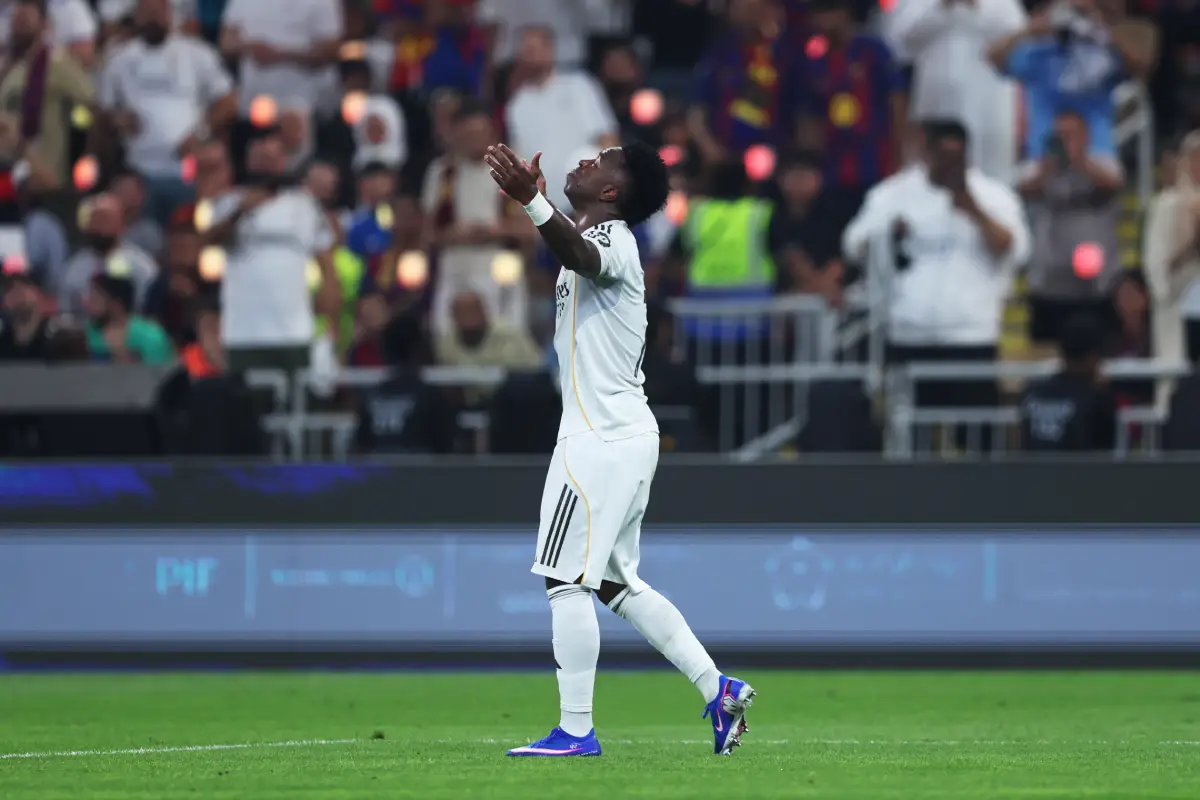 JEDDAH, SAUDI ARABIA - JANUARY 11: Vinicius Jr of Real Madrid celebrates scoring his team's first goal during the Spanish Super Cup Final between FC Barcelona and Real Madrid at King Abdullah Sports City Hall Stadium on January 11, 2026 in Jeddah, Saudi Arabia. (Photo by Yasser Bakhsh/Getty Images)