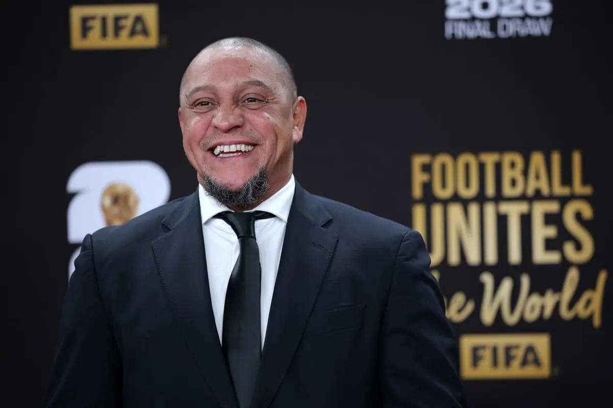 WASHINGTON, DC - DECEMBER 05: Roberto Carlos, FIFA legend poses on the red carpet prior to the FIFA World Cup 2026 Official Draw at John F. Kennedy Center for the Performing Arts on December 05, 2025 in Washington, DC. (Photo by Kevin Dietsch/Getty Images).