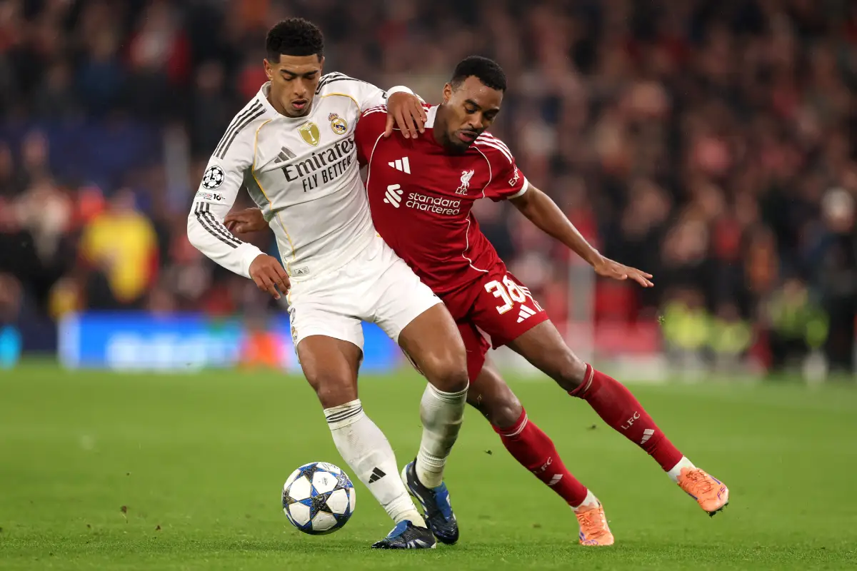 LIVERPOOL, ENGLAND - NOVEMBER 04: Jude Bellingham of Real Madrid battles for possession with Ryan Gravenberch of Liverpool during the UEFA Champions League 2025/26 League Phase MD4 match between Liverpool FC and Real Madrid C.F. at Anfield on November 04, 2025 in Liverpool, England. (Photo by Carl Recine/Getty Images)