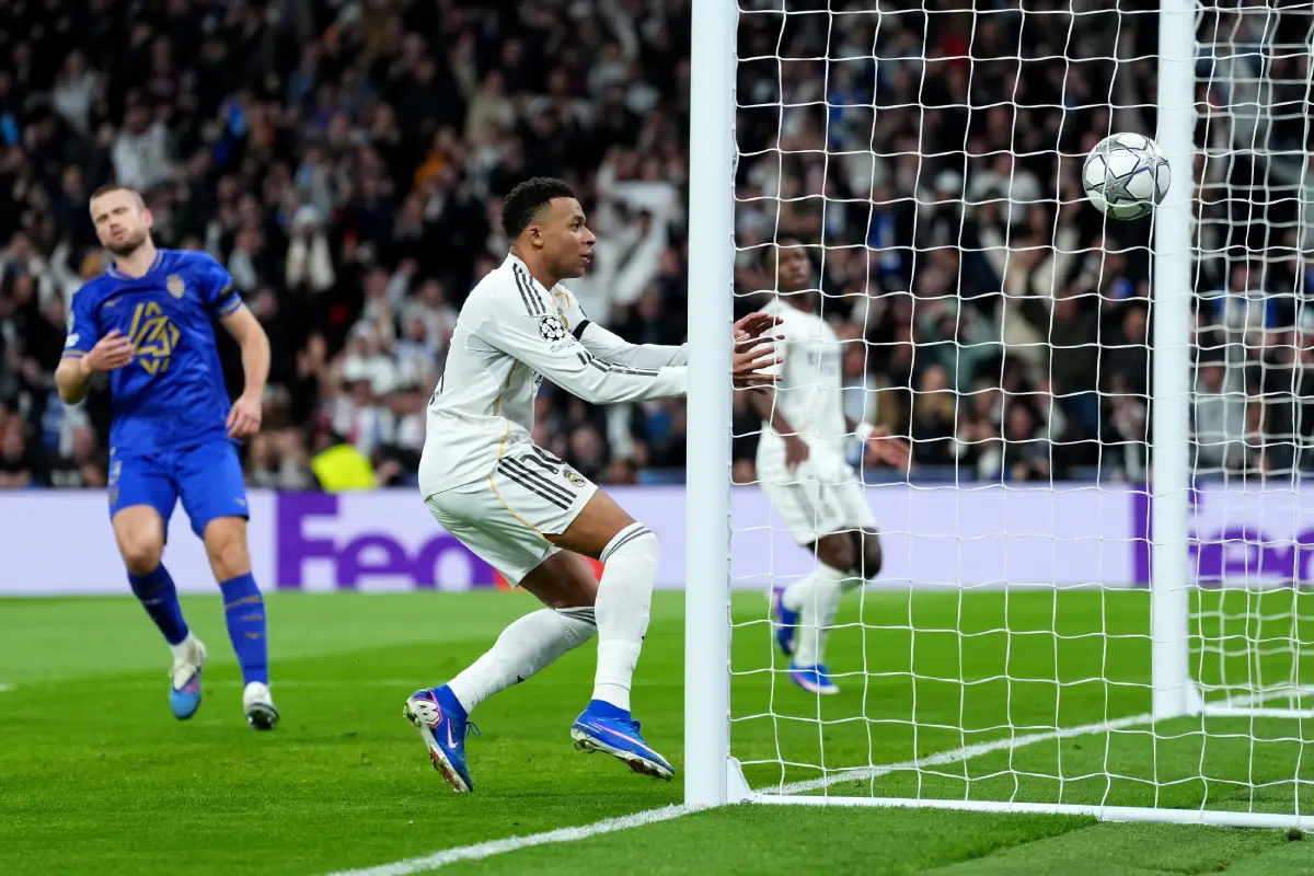 MADRID, SPAIN - JANUARY 20: Kylian Mbappe of Real Madrid scores his team's second goal during the UEFA Champions League 2025/26 League Phase MD7 match between Real Madrid C.F. and AS Monaco at Estadio Santiago Bernabeu on January 20, 2026 in Madrid, Spain. (Photo by Angel Martinez/Getty Images)