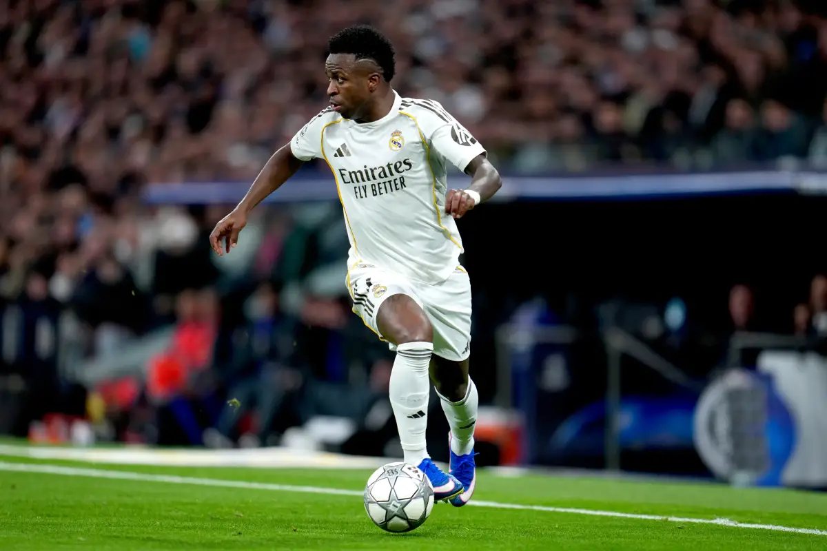 MADRID, SPAIN - JANUARY 20: Vinicius Junior of Real Madrid runs with the ball during the UEFA Champions League 2025/26 League Phase MD7 match between Real Madrid C.F. and AS Monaco at Estadio Santiago Bernabeu on January 20, 2026 in Madrid, Spain. (Photo by Aitor Alcalde/Getty Images)