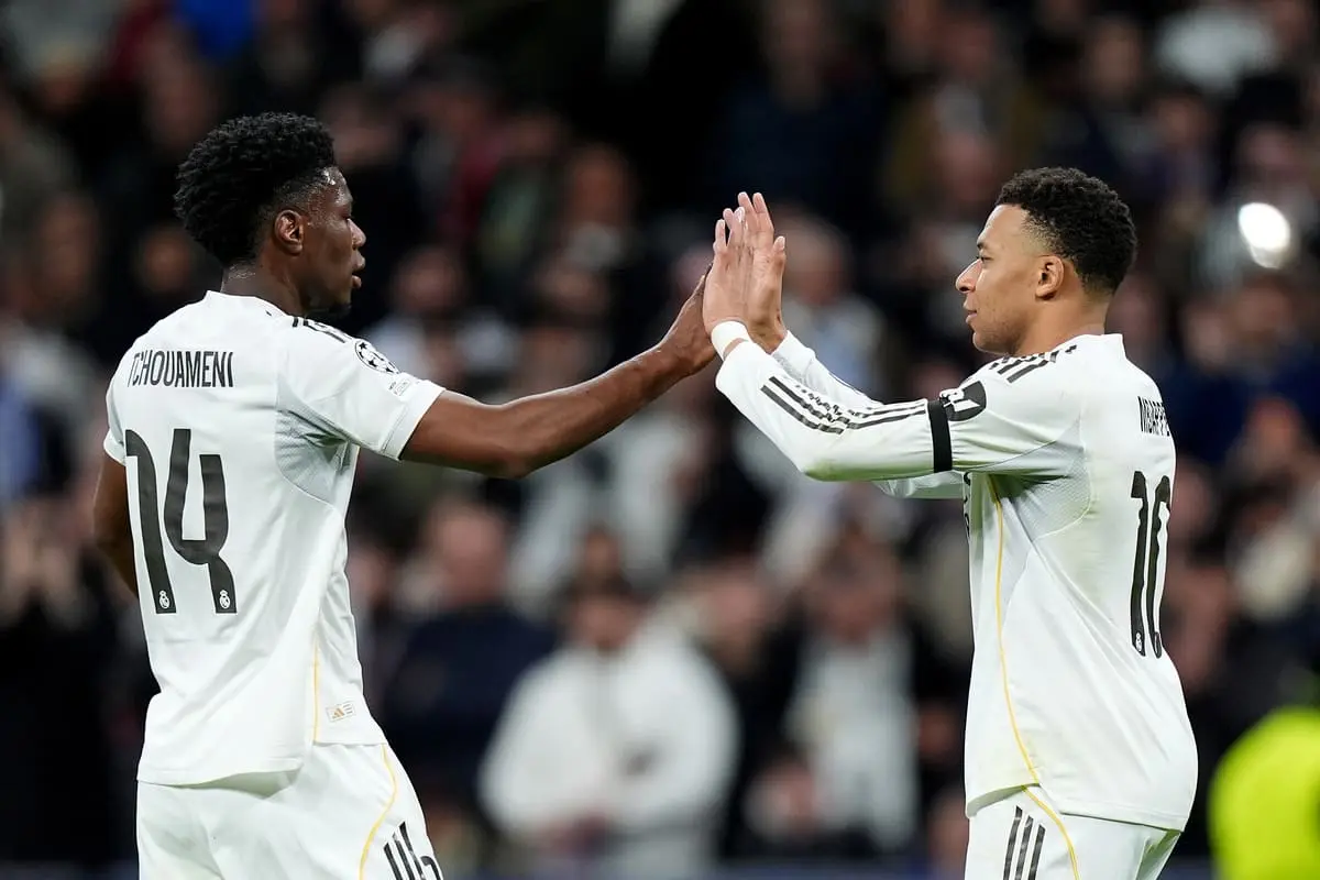 MADRID, SPAIN - JANUARY 20: Kylian Mbappe of Real Madrid celebrates scoring his team's second goal with Aurelien Tchouameni during the UEFA Champions League 2025/26 League Phase MD7 match between Real Madrid C.F. and AS Monaco at Estadio Santiago Bernabeu on January 20, 2026 in Madrid, Spain. (Photo by Angel Martinez/Getty Images).