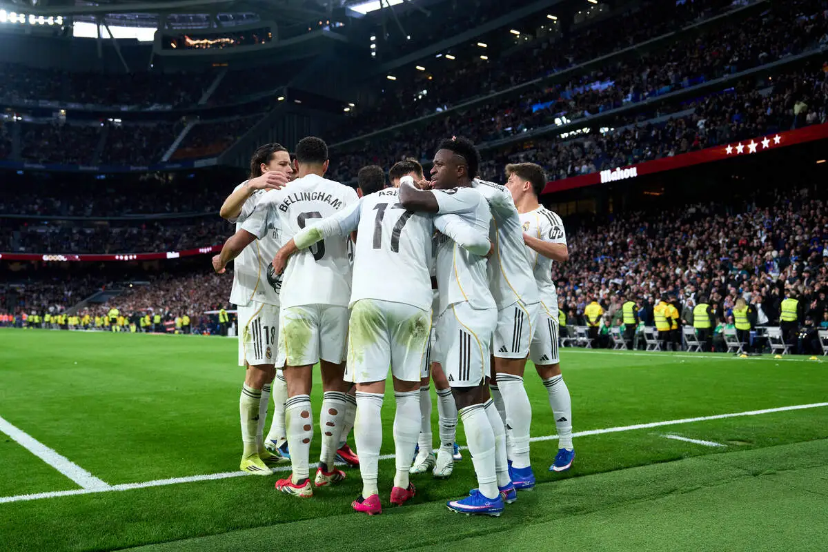 MADRID, SPAIN - JANUARY 17: Raúl Asencio of Real Madrid celebrates with teammates after scoring their team's second goal during the LaLiga EA Sports match between Real Madrid CF and Levante UD at Estadio Santiago Bernabeu on January 17, 2026 in Madrid, Spain. (Photo by Angel