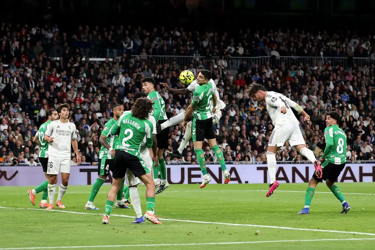 MADRID, SPAIN - JANUARY 04: Raul Asencio of Real Madrid scores his team's third goal during the LaLiga EA Sports match between Real Madrid CF and Real Betis Balompie at Estadio Santiago Bernabeu on January 04, 2026 in Madrid, Spain. (Photo by Florencia Tan Jun/Getty Images).