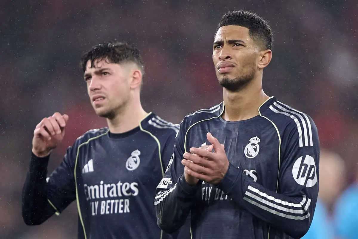 LISBON, PORTUGAL - JANUARY 28: Jude Bellingham (R) and Federico Valverde (L) of Real Madrid CF, react at the end of the UEFA Champions League 2025/26 League Phase MD8 match between SL Benfica and Real Madrid C.F. at Estadio Da Luz on January 28, 2026 in Lisbon, Portugal. (Photo by Jose Manuel Alvarez Rey/Getty Images).