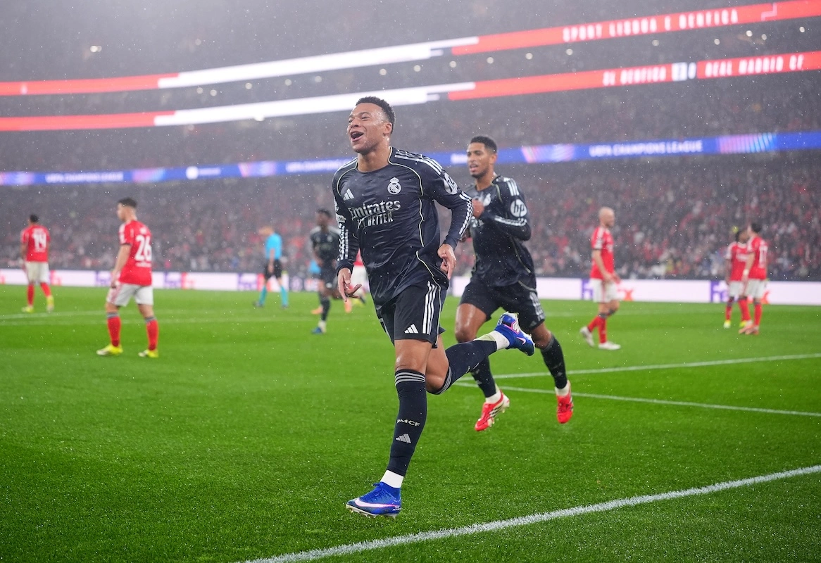 LISBON, PORTUGAL - JANUARY 28: Kylian Mbappe of Real Madrid celebrates scoring his team's first goal during the UEFA Champions League 2025/26 League Phase MD8 match between SL Benfica and Real Madrid C.F. at Estadio do SL Benfica on January 28, 2026 in Lisbon, Portugal. (Photo by Jose Manuel Alvarez Rey/Getty Images)