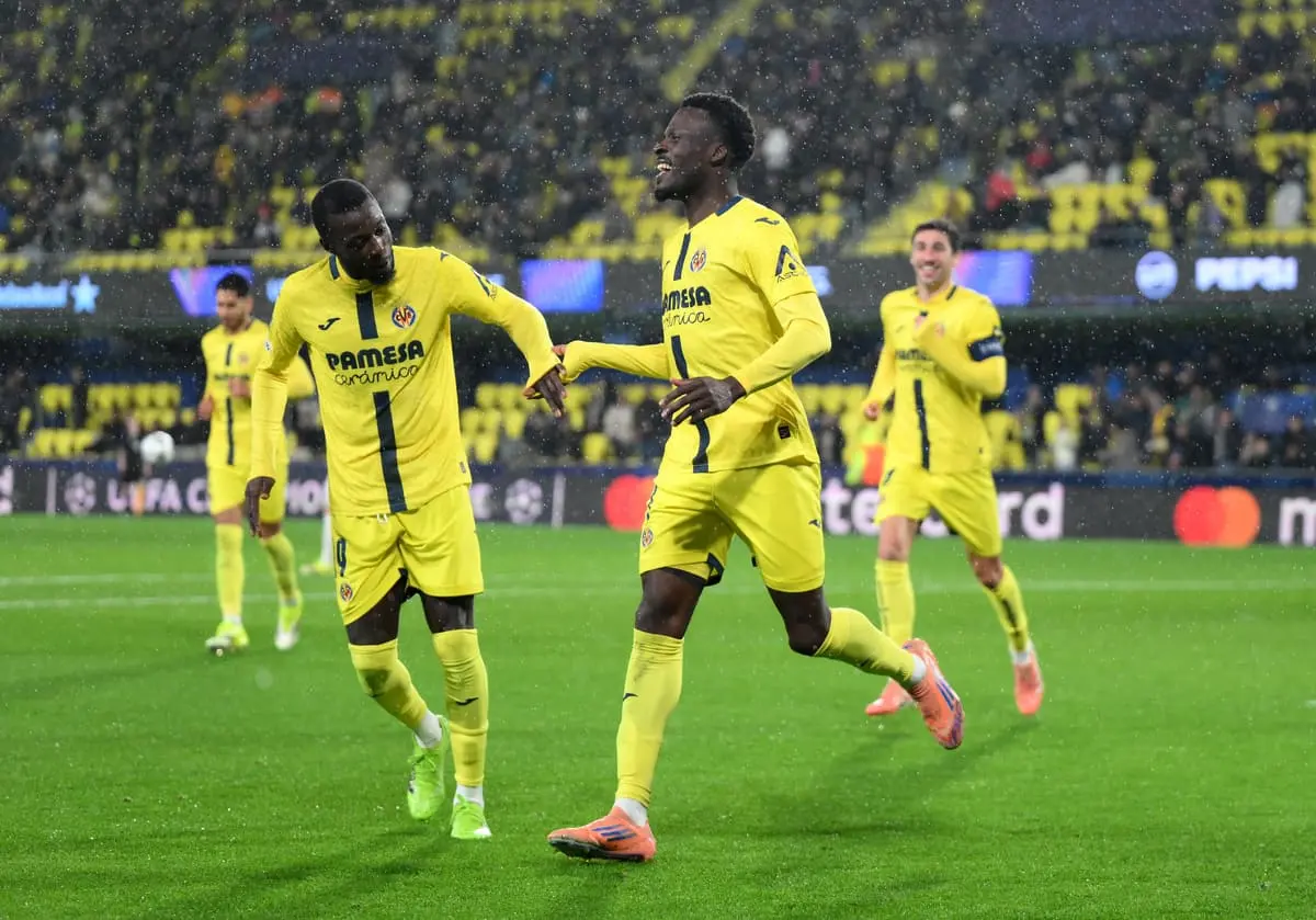 VILLARREAL, SPAIN - JANUARY 20: Tani Oluwaseyi of Villarreal CF celebrates scoring his team's first goal with Nicolas Pepe during the UEFA Champions League 2025/26 League Phase MD7 match between Villarreal CF and AFC Ajax at Estadio de la Ceramica on January 20, 2026 in Villarreal, Spain. (Photo by David Ramos/Getty Images)