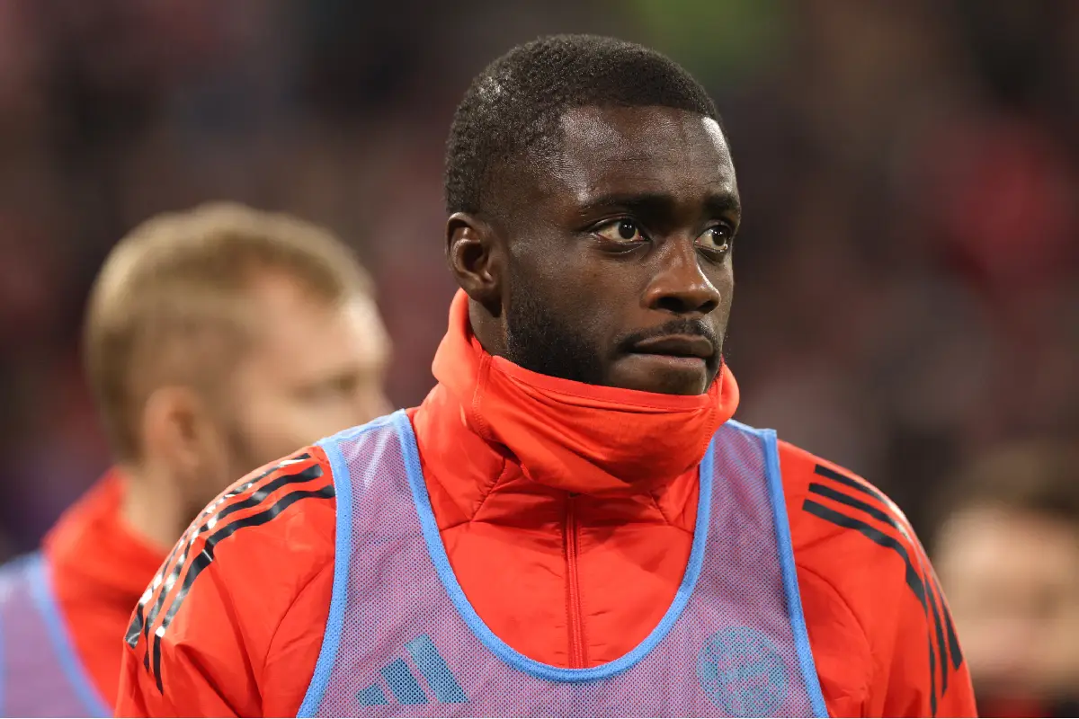 MUNICH, GERMANY - DECEMBER 14: Dayot Upamecano of FC Bayern Munich warms up as a substitute during the Bundesliga match between FC Bayern München and 1. FSV Mainz 05 at Allianz Arena on December 14, 2025 in Munich, Germany. (Photo by Adam Pretty/Getty Images)