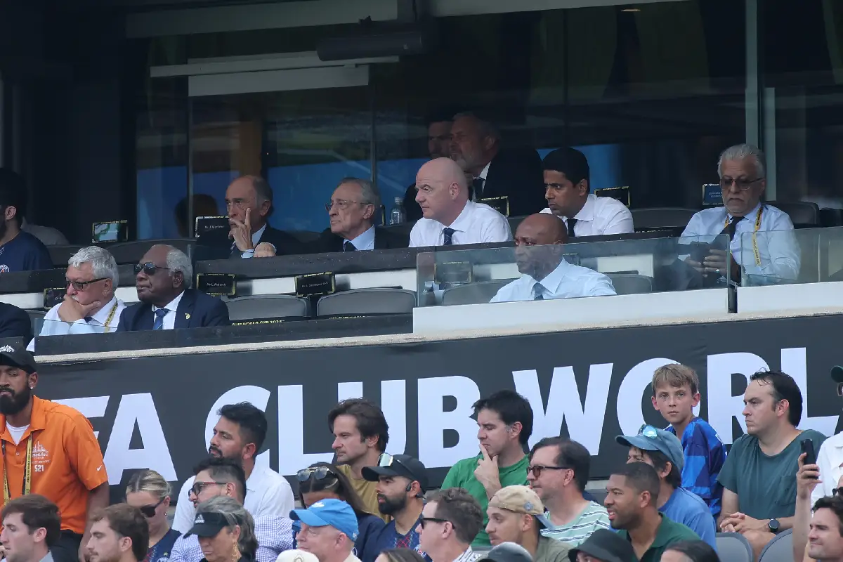 EAST RUTHERFORD, NEW JERSEY - JULY 09: President of Real Madrid, Florentino Pérez, Gianni Infantino, President of FIFA and Paris Saint-Germain owner Nasser Al-Khelaifi watch on during the FIFA Club World Cup 2025 semi-final match between Paris Saint-Germain and Real Madrid CF at MetLife Stadium on July 09, 2025 in East Rutherford, New Jersey. (Photo by Alex Grimm/Getty Images)