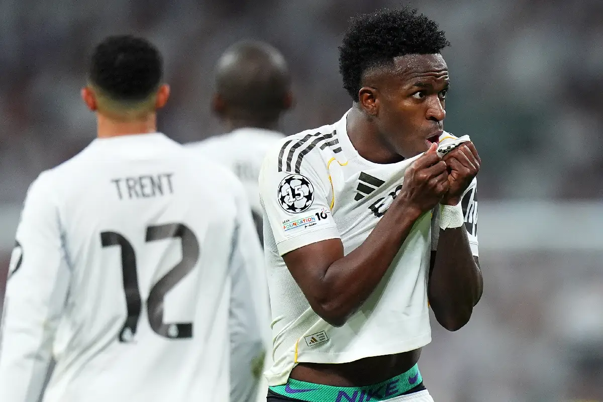 MADRID, SPAIN - FEBRUARY 25: Vinicius Junior of Real Madrid celebrates scoring his team's second goal during the UEFA Champions League 2025/26 League Knockout Play-off Second Leg match between Real Madrid C.F. and SL Benfica at Estadio Santiago Bernabeu on February 25, 2026 in Madrid, Spain. (Photo by Angel Martinez/Getty Images)