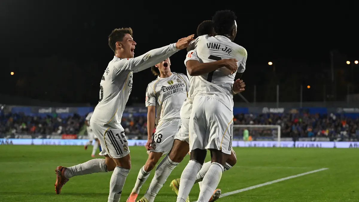 GETAFE, SPAIN - OCTOBER 19: Kylian Mbappe of Real Madrid celebrates scoring his team's first goal with teammates Arda Guler and Vinicius Junior during the LaLiga EA Sports match between Getafe CF and Real Madrid CF at Coliseum Alfonso Perez on October 19, 2025 in Getafe, Spain. (Photo by Denis Doyle/Getty Images)