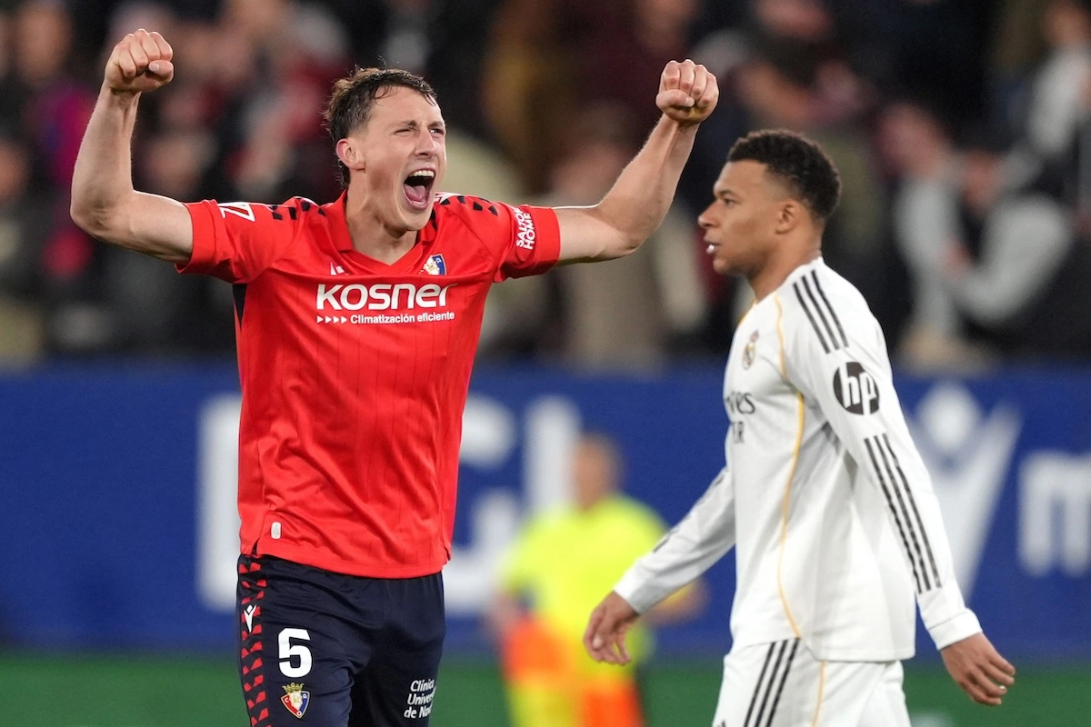 PAMPLONA, SPAIN - FEBRUARY 21: Jorge Herrando of CA Osasuna celebrates his team's second goal scored by teammate Raul Garcia (not pictured) as Kylian Mbappe of Real Madrid looks dejected during the LaLiga EA Sports match between CA Osasuna and Real Madrid CF at Estadio El Sadar on February 21, 2026 in Pamplona, Spain. (Photo by Juan Manuel Serrano Arce/Getty Images)