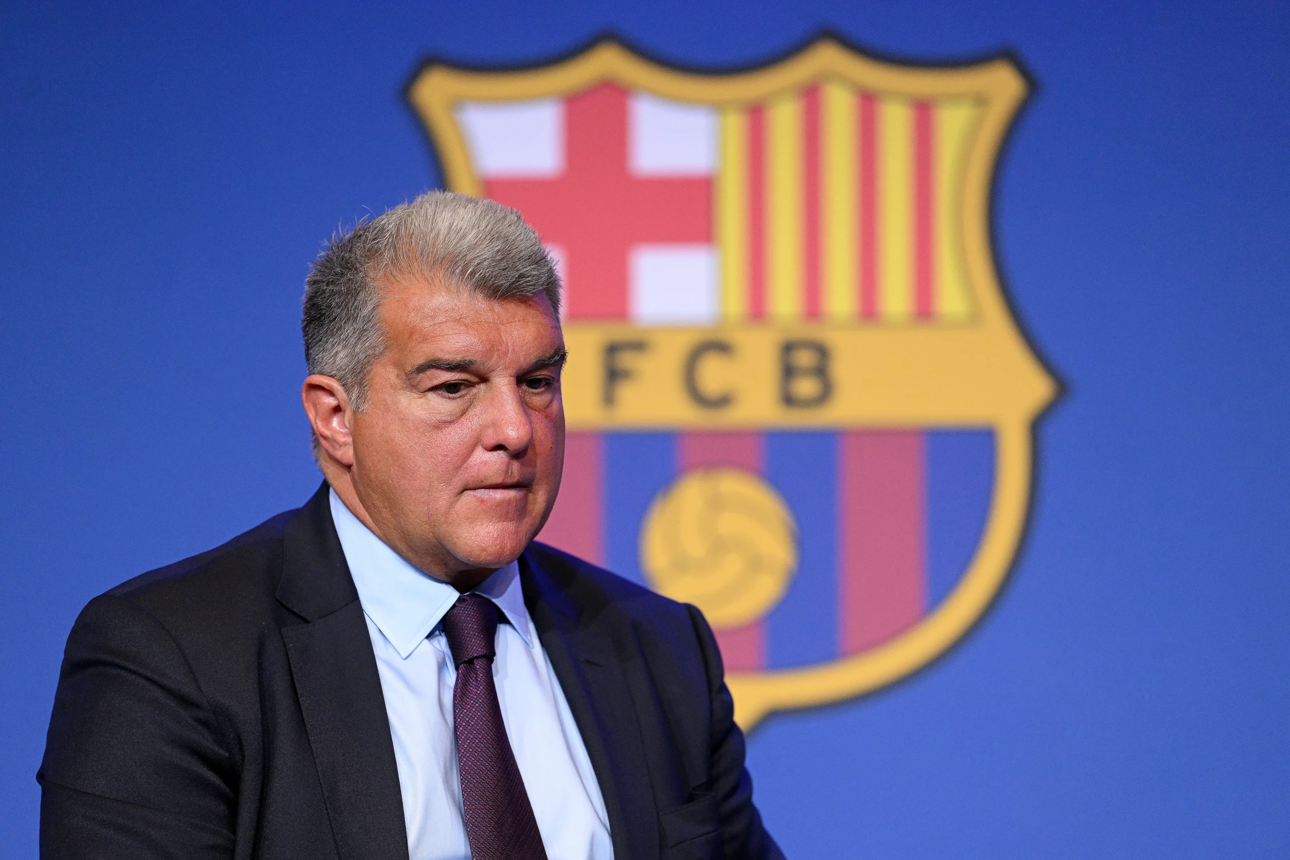 BARCELONA, SPAIN - APRIL 17: FC Barcelona President Joan Laporta gives a press conference in response to recent allegations over payments made to referees by the club, at Spotify Camp Nou on April 17, 2023 in Barcelona, Spain. UEFA and Spanish authorities are investigating Barcelona over the payment of millions of euros to the company of Jose Maria Enriquez Negreira, the former vice-president of Spanish football's refereeing committee. If found guilty, UEFA's investigation could lead to a Champions League ban for the club. (Photo by David Ramos/Getty Images)
