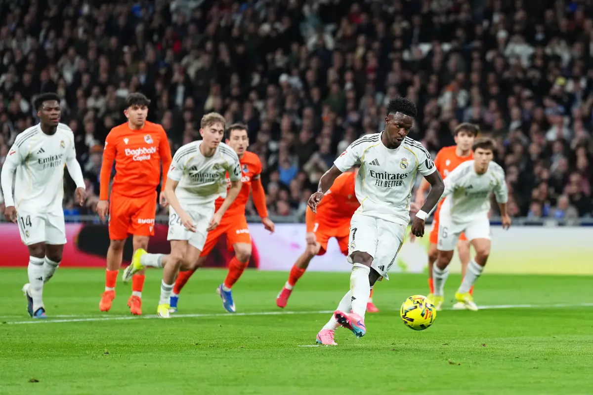 MADRID, SPAIN - FEBRUARY 14: Vinicius Junior of Real Madrid scores his team's second goal from the penalty spot during the LaLiga EA Sports match between Real Madrid CF and Real Sociedad at Estadio Santiago Bernabeu on February 14, 2026 in Madrid, Spain. (Photo by Angel Martinez/Getty Images)