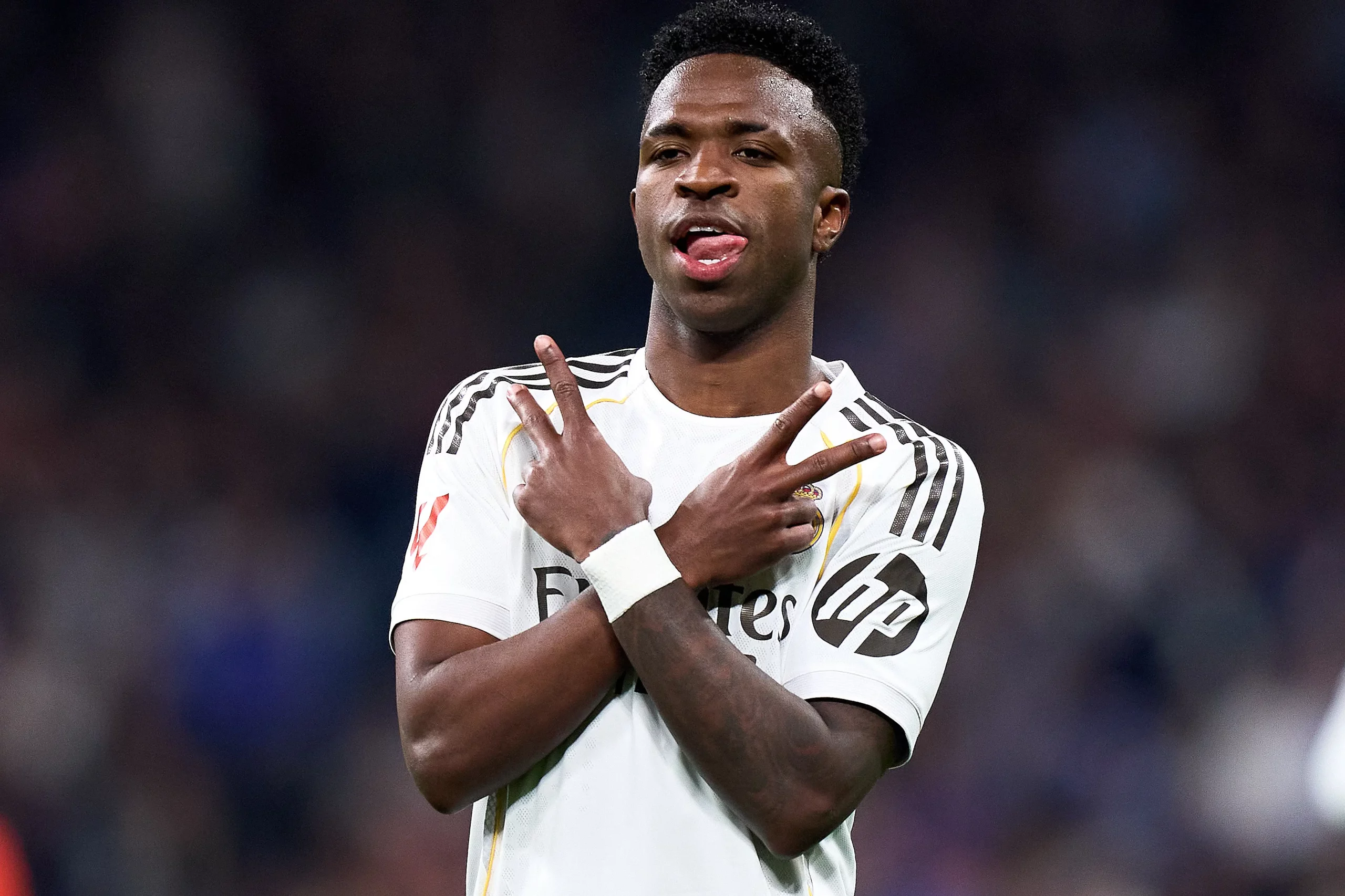 MADRID, SPAIN - FEBRUARY 14: Vinicius Junior of Real Madrid celebrates after scoring his team's fourth goal during the LaLiga EA Sports match between Real Madrid CF and Real Sociedad at Estadio Santiago Bernabeu on February 14, 2026 in Madrid, Spain. (Photo by Angel Martinez/Getty Images)