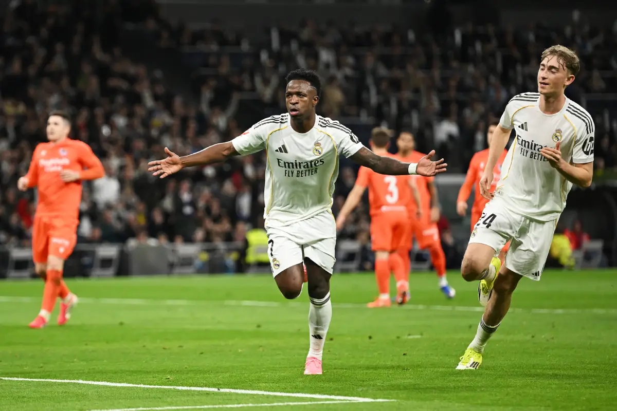 MADRID, SPAIN - FEBRUARY 14: Vinicius Junior of Real Madrid celebrates scoring his team's second goal with teammate Dean Huijsen during the LaLiga EA Sports match between Real Madrid CF and Real Sociedad at Estadio Santiago Bernabeu on February 14, 2026 in Madrid, Spain. (Photo by Denis Doyle/Getty Images)