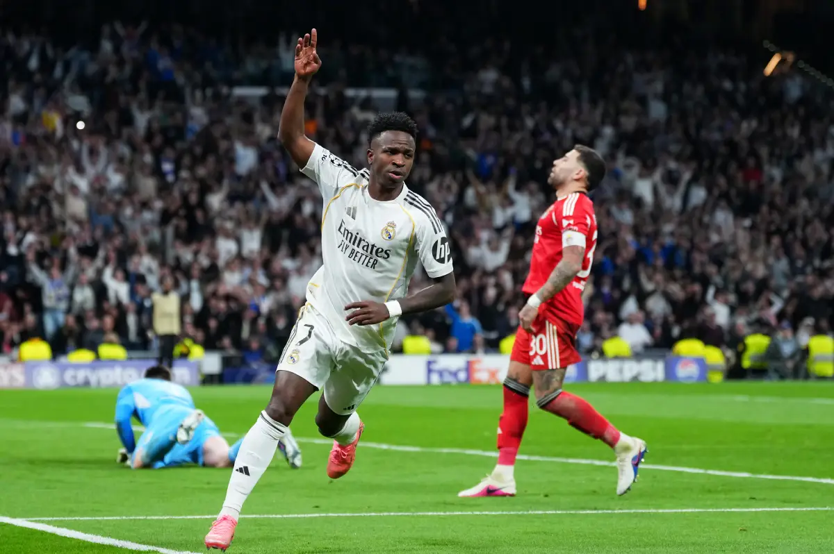 MADRID, SPAIN - FEBRUARY 25: Vinicius Junior of Real Madrid celebrates scoring his team's second goal during the UEFA Champions League 2025/26 League Knockout Play-off Second Leg match between Real Madrid C.F. and SL Benfica at Estadio Santiago Bernabeu on February 25, 2026 in Madrid, Spain. (Photo by Angel Martinez/Getty Images)