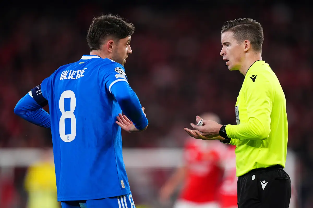 LISBON, PORTUGAL - FEBRUARY 17: Federico Valverde of Real Madrid gestures as he speaks to referee Francois Letexier during the UEFA Champions League 2025/26 League Knockout Play-off First Leg match between SL Benfica and Real Madrid C.F. at Estadio do SL Benfica on February 17, 2026 in Lisbon, Portugal. (Photo by Angel Martinez/Getty Images)