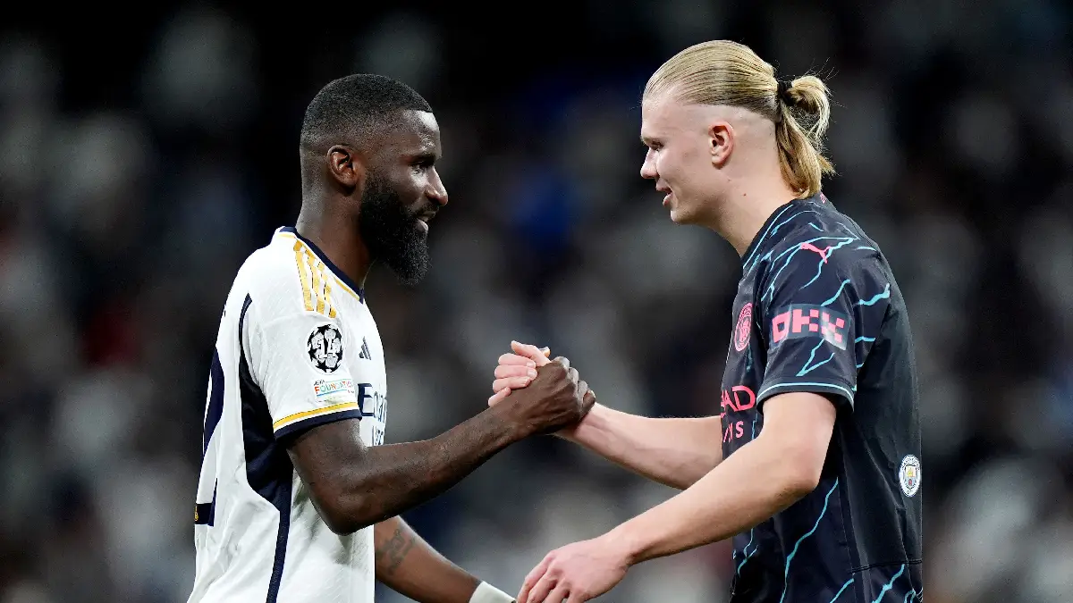 MADRID, SPAIN - APRIL 09: Antonio Ruediger of Real Madrid and Erling Haaland of Manchester City shake hands after the draw in the UEFA Champions League quarter-final first leg match between Real Madrid CF and Manchester City at Estadio Santiago Bernabeu on April 09, 2024 in Madrid, Spain. (Photo by Angel Martinez/Getty Images)
