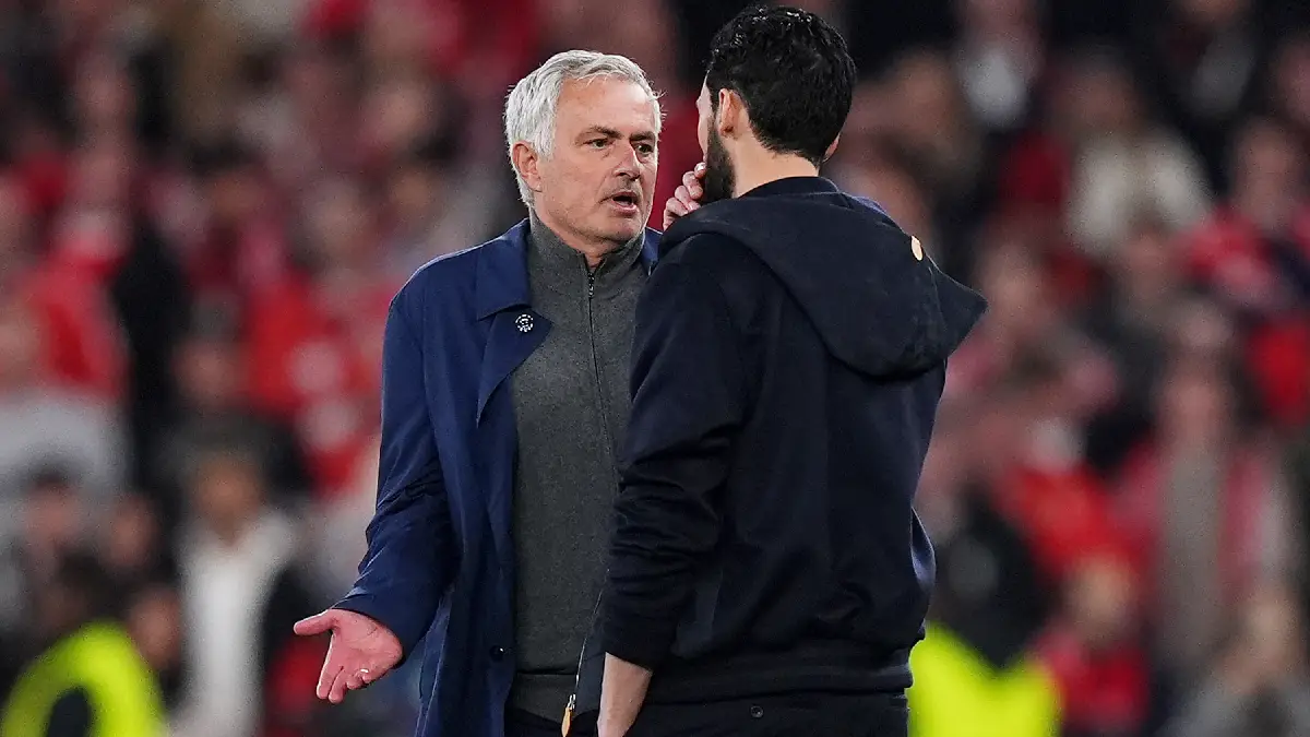 LISBON, PORTUGAL - FEBRUARY 17: Alvaro Arbeloa, Head Coach of Real Madrid, speaks to Jose Mourinho, Head Coach of Benfica, after a clash between Gianluca Prestianni and Vinicius Junior during the UEFA Champions League 2025/26 League Knockout Play-off First Leg match between SL Benfica and Real Madrid C.F. at Estadio do SL Benfica on February 17, 2026 in Lisbon, Portugal. (Photo by Angel Martinez/Getty Images)