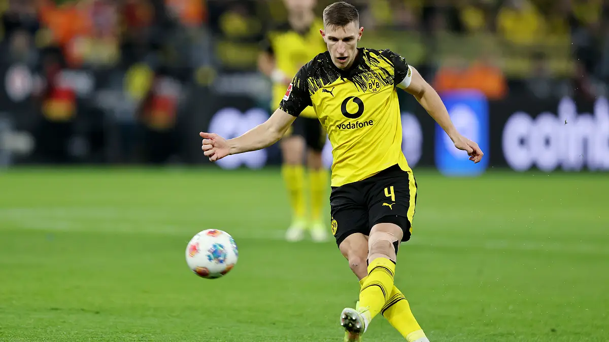 DORTMUND, GERMANY - FEBRUARY 01: Nico Schlotterbeck of Borussia Dortmund runs with the ball during the Bundesliga match between Borussia Dortmund and 1. FC Heidenheim 1846 at Signal Iduna Park on February 01, 2026 in Dortmund, Germany. (Photo by Christof Koepsel/Getty Images)