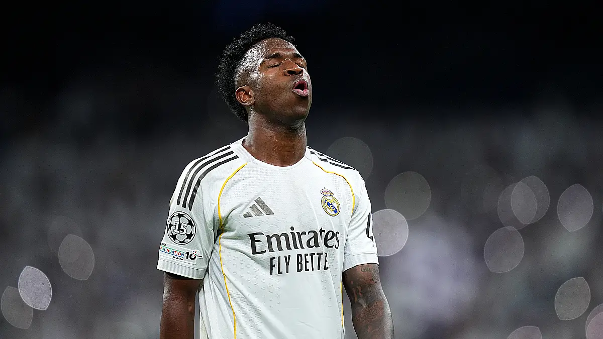 MADRID, SPAIN - FEBRUARY 25: Vinicius Junior of Real Madrid reacts at full time following victory during the UEFA Champions League 2025/26 League Knockout Play-off Second Leg match between Real Madrid C.F. and SL Benfica at Estadio Santiago Bernabeu on February 25, 2026 in Madrid, Spain. (Photo by Angel Martinez/Getty Images)