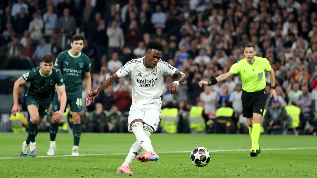MADRID, SPAIN - MARCH 11: Vinicius Jr of Real Madrid has a penalty saved by Gianluigi Donnarumma of Manchester City (not pictured) during the UEFA Champions League 2025/26 Round of 16 First Leg match between Real Madrid CF and Manchester City FC at Estadio Santiago Bernabeu on March 11, 2026 in Madrid, Spain. (Photo by Florencia Tan Jun/Getty Images)