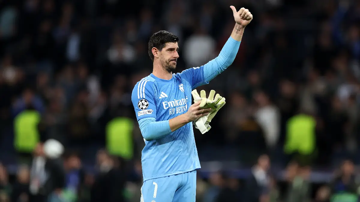 MADRID, SPAIN - MARCH 11: Thibaut Courtois of Real Madrid celebrates after their sides third goal by Federico Valverde (not pictured) during the UEFA Champions League 2025/26 Round of 16 First Leg match between Real Madrid CF and Manchester City FC at Estadio Santiago Bernabeu on March 11, 2026 in Madrid, Spain. (Photo by Florencia Tan Jun/Getty Images)