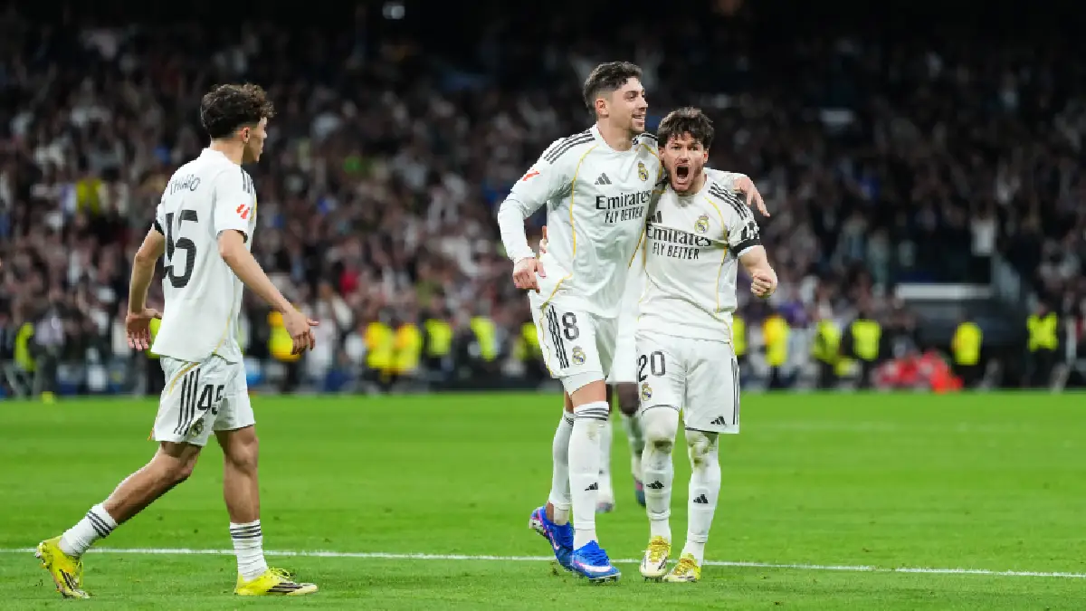 MADRID, SPAIN - MARCH 14: Federico Valverde of Real Madrid celebrates scoring his team's second goal with teammate Fran Garcia during the LaLiga EA Sports match between Real Madrid CF and Elche CF at Estadio Santiago Bernabeu on March 14, 2026 in Madrid, Spain. (Photo by Angel Martinez/Getty Images)