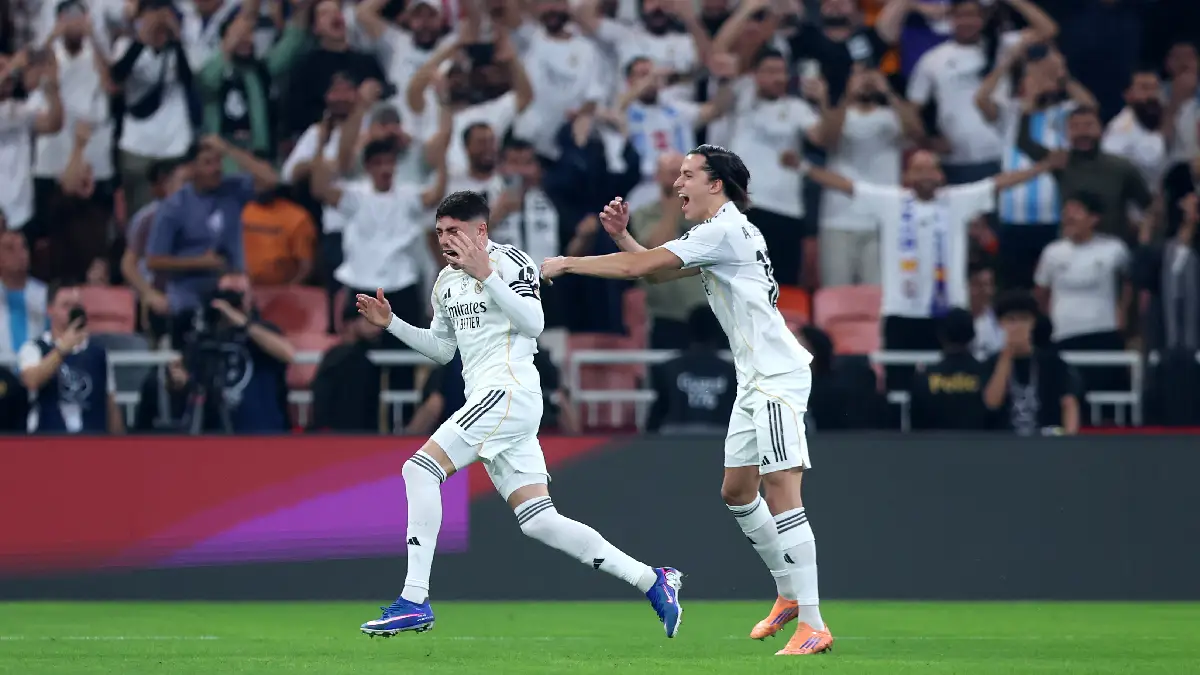 JEDDAH, SAUDI ARABIA - JANUARY 08: Federico Valverde of Real Madrid celebrates scoring his team's first goal with teammate Alvaro Carreras during the Spanish Super Cup Semi-Final match between Real Madrid and Atletico Madrid at King Abdullah Sports City Hall Stadium on January 08, 2026 in Jeddah, Saudi Arabia. (Photo by Yasser Bakhsh/Getty Images)