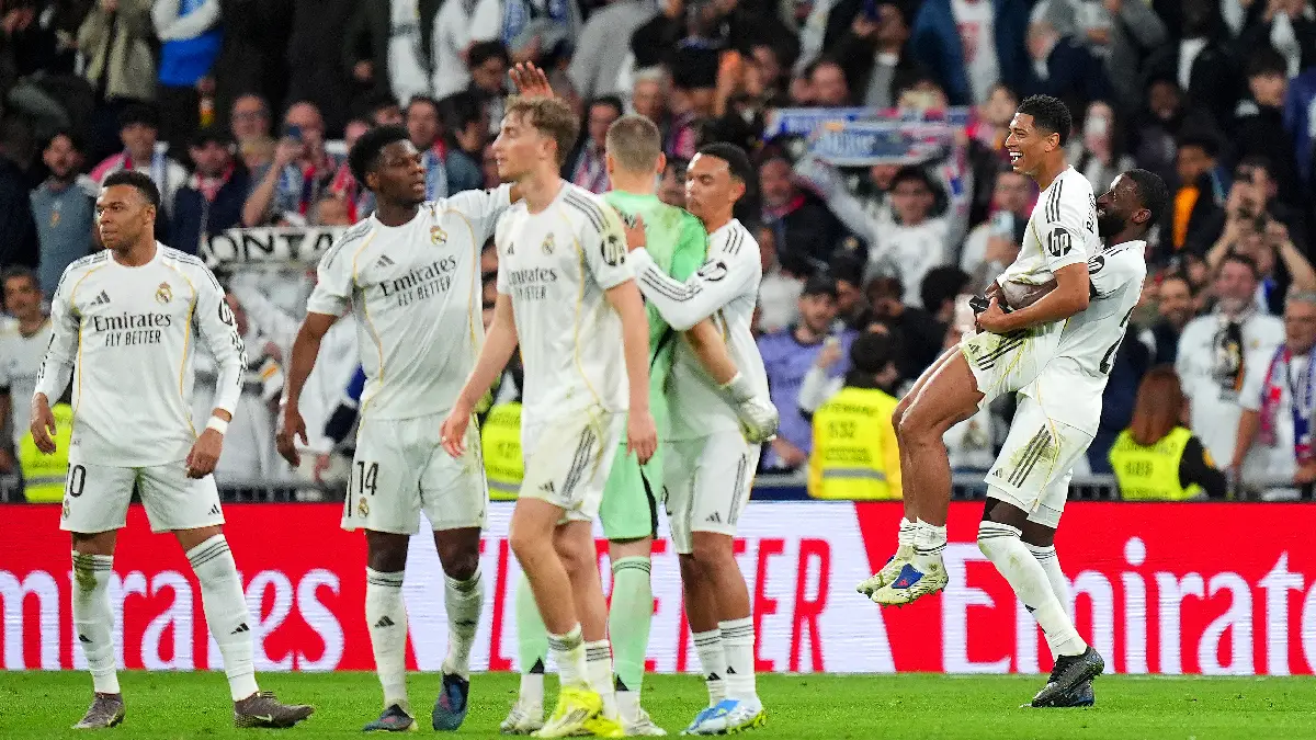 MADRID, SPAIN - MARCH 22: Jude Bellingham and Antonio Ruediger of Real Madrid celebrate after the team's victory in the LaLiga EA Sports match between Real Madrid CF and Atletico de Madrid at Estadio Santiago Bernabeu on March 22, 2026 in Madrid, Spain. (Photo by Angel Martinez/Getty Images)