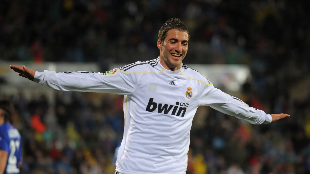GETAFE, SPAIN - MARCH 25: Gonzalo Higuain of Real Madrid celebrates after scoring his first goal during La Liga match between Getafe and Real Madrid at the Coliseum Alfonso Perez stadium on March 25, 2010 in Getafe, Spain. (Photo by Denis Doyle/Getty Images)