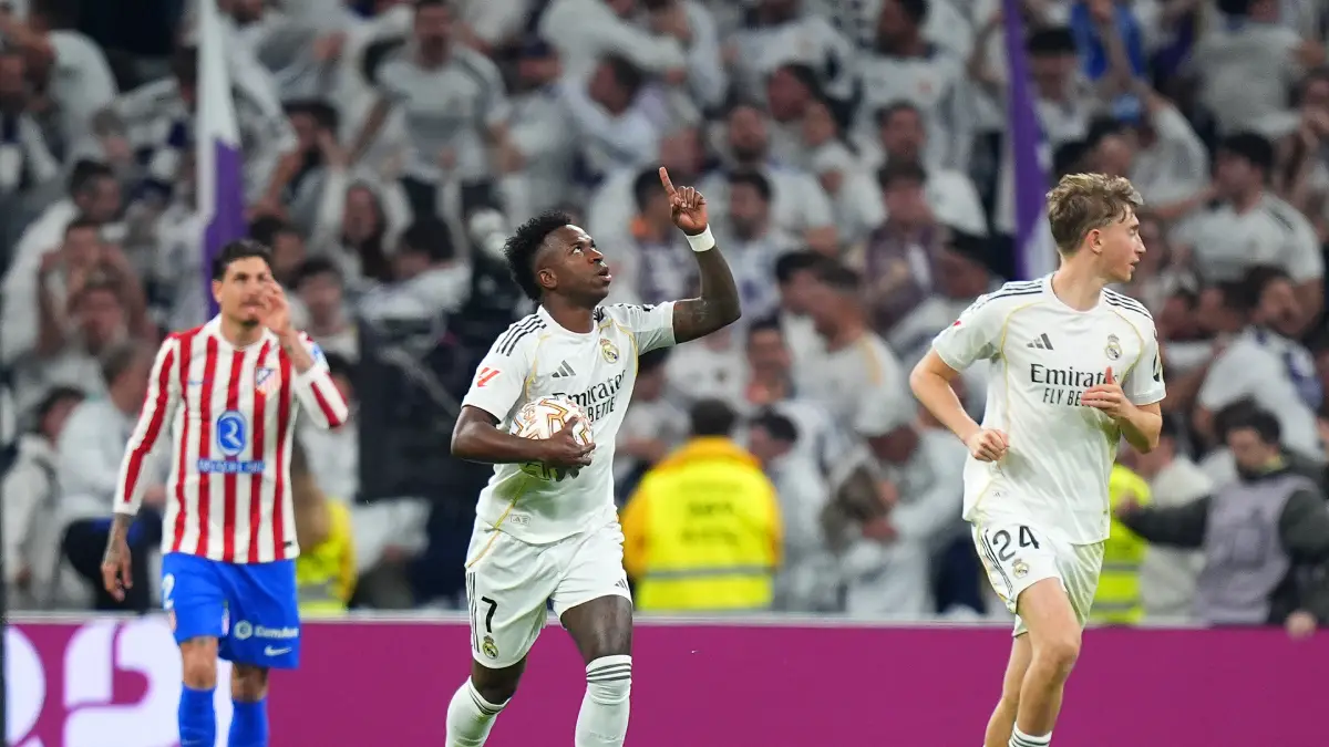 MADRID, SPAIN - MARCH 22: Vinicius Junior of Real Madrid celebrates scoring his team's first goal during the LaLiga EA Sports match between Real Madrid CF and Atletico de Madrid at Estadio Santiago Bernabeu on March 22, 2026 in Madrid, Spain. (Photo by Angel Martinez/Getty Images)