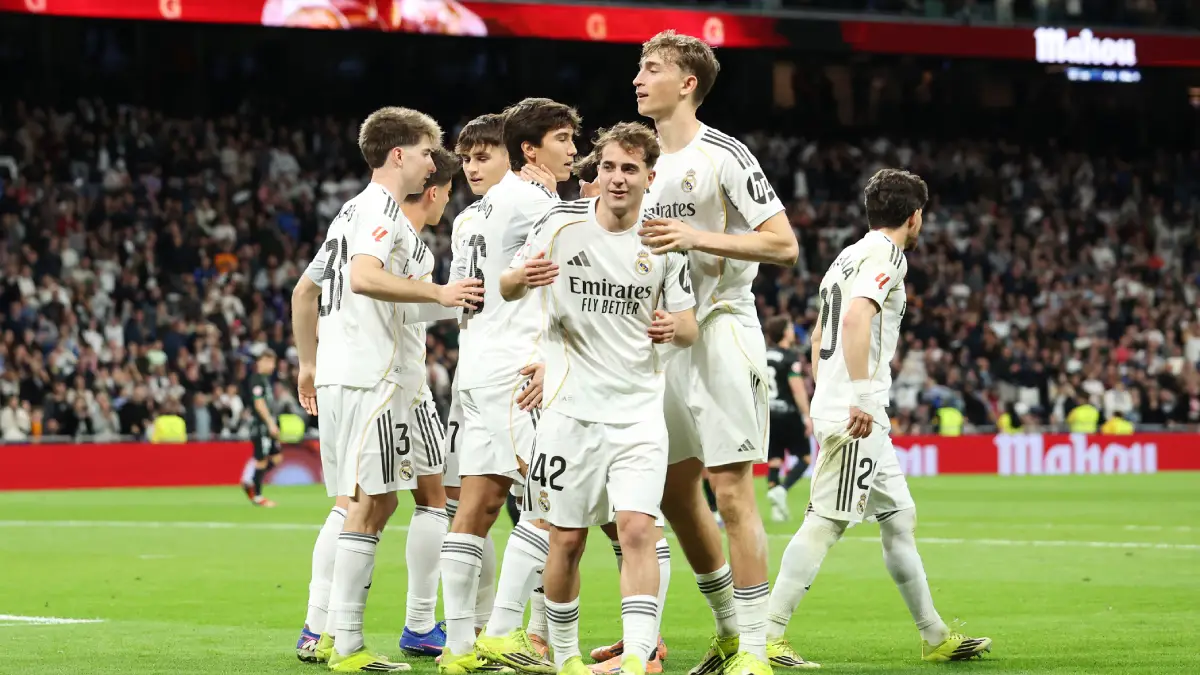 MADRID, SPAIN - MARCH 14: Dean Huijsen of Real Madrid celebrates scoring his team's third goal with teammates during the LaLiga EA Sports match between Real Madrid CF and Elche CF at Estadio Santiago Bernabeu on March 14, 2026 in Madrid, Spain. (Photo by Florencia Tan Jun/Getty Images)