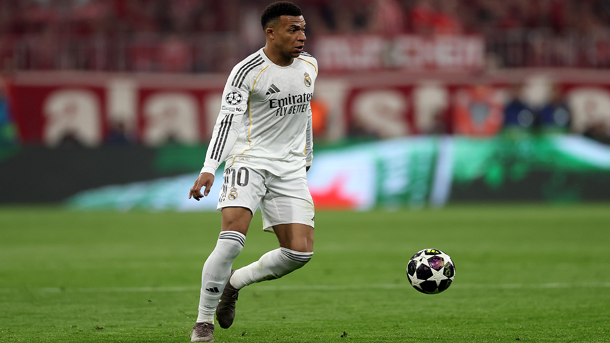 MUNICH, GERMANY - APRIL 15: Kylian Mbappe of Real Madrid runs with the ball during the UEFA Champions League 2025/26 Quarter-Final Second Leg match between FC Bayern München and Real Madrid CF at Football Arena Munich on April 15, 2026 in Munich, Germany. (Photo by Lars Baron/Getty Images)
