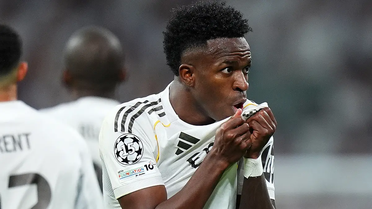 MADRID, SPAIN - FEBRUARY 25: Vinicius Junior of Real Madrid celebrates scoring his team's second goal during the UEFA Champions League 2025/26 League Knockout Play-off Second Leg match between Real Madrid C.F. and SL Benfica at Estadio Santiago Bernabeu on February 25, 2026 in Madrid, Spain. (Photo by Angel Martinez/Getty Images)
