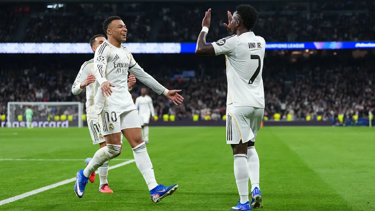 MADRID, SPAIN - JANUARY 20: Kylian Mbappe and Vinicius Junior of Real Madrid celebrate their side's fourth goal, an own goal by Thilo Kehrer of AS Monaco (not pictured), during the UEFA Champions League 2025/26 League Phase MD7 match between Real Madrid C.F. and AS Monaco at Estadio Santiago Bernabeu on January 20, 2026 in Madrid, Spain. (Photo by Aitor Alcalde/Getty Images)