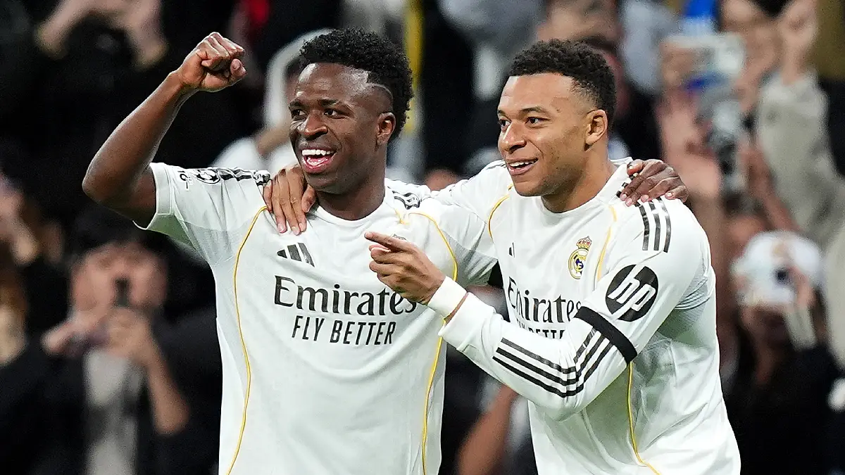 MADRID, SPAIN - JANUARY 20: Kylian Mbappe of Real Madrid celebrates scoring his team's first goal with Vinicius Junior during the UEFA Champions League 2025/26 League Phase MD7 match between Real Madrid C.F. and AS Monaco at Estadio Santiago Bernabeu on January 20, 2026 in Madrid, Spain. (Photo by Angel Martinez/Getty Images)