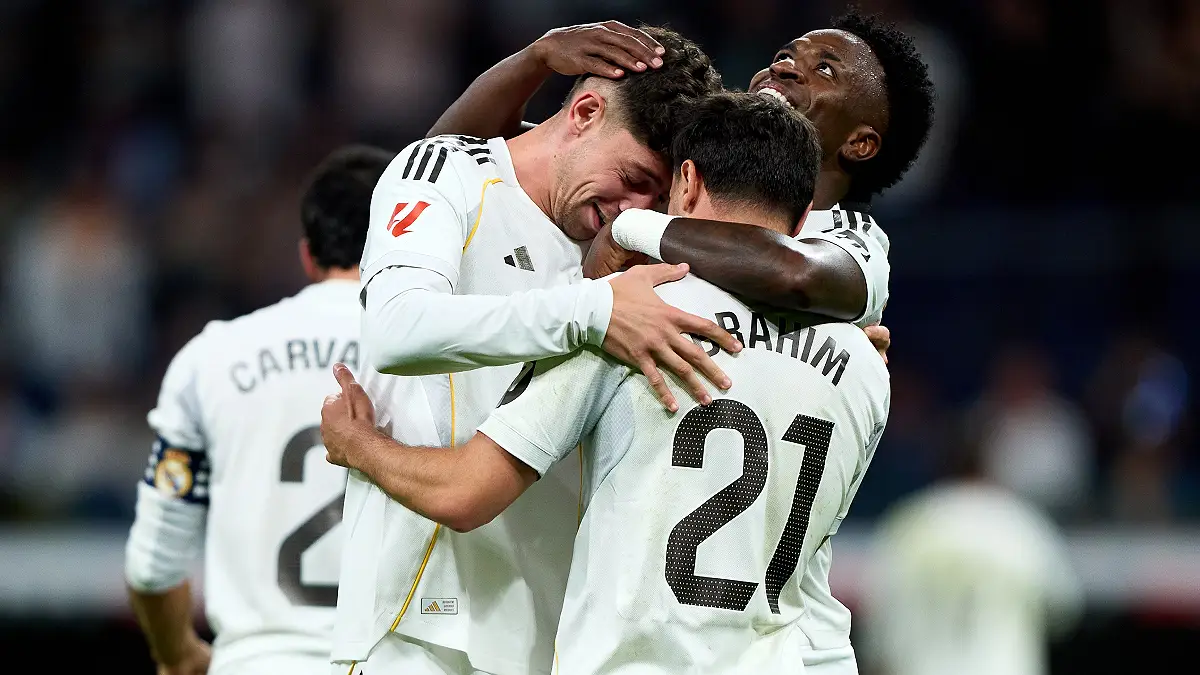 MADRID, SPAIN - APRIL 10: Federico Valverde of Real Madrid celebrates after scoring his team's first goal with Brahim Diaz and Vinicius Junior during the LaLiga EA Sports match between Real Madrid CF and Girona FC at Estadio Santiago Bernabeu on April 10, 2026 in Madrid, Spain. (Photo by Angel Martinez/Getty Images)