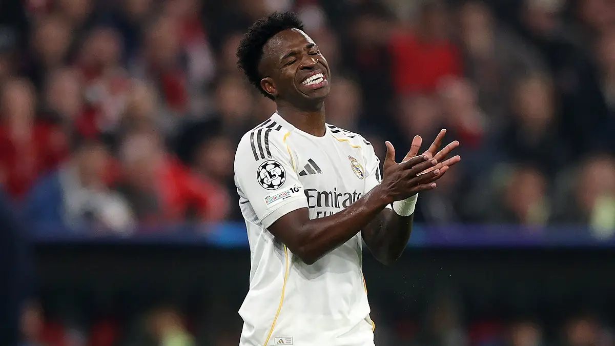 MUNICH, GERMANY - APRIL 15: Vinicius Jr. of Real Madrid reacts during the UEFA Champions League 2025/26 Quarter-Final Second Leg match between FC Bayern München and Real Madrid CF at Football Arena Munich on April 15, 2026 in Munich, Germany. (Photo by Adam Pretty/Getty Images)