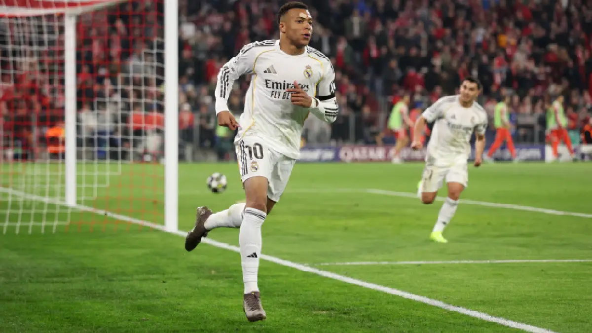 MUNICH, GERMANY - APRIL 15: Kylian Mbappe of Real Madrid celebrates scoring his team's third goal during the UEFA Champions League 2025/26 Quarter-Final Second Leg match between FC Bayern München and Real Madrid CF at Football Arena Munich on April 15, 2026 in Munich, Germany. (Photo by Adam Pretty/Getty Images)