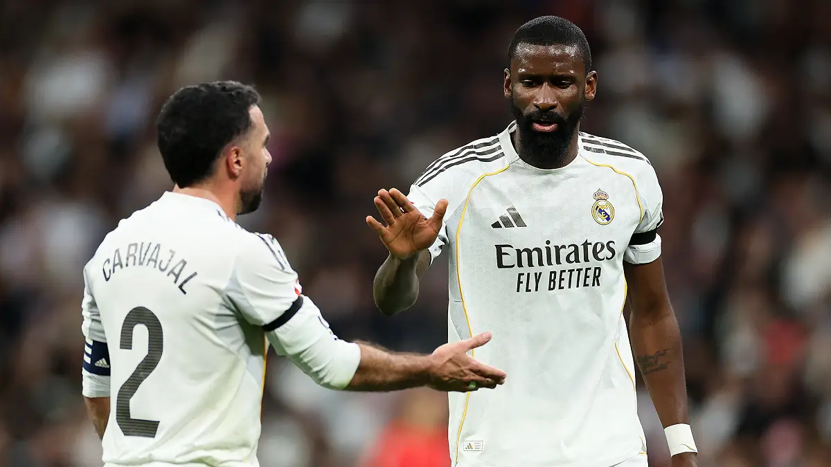 MADRID, SPAIN - MARCH 14: Antonio Ruediger of Real Madridinteracts with his teammate Daniel Carvajal during the LaLiga EA Sports match between Real Madrid CF and Elche CF at Estadio Santiago Bernabeu on March 14, 2026 in Madrid, Spain. (Photo by Florencia Tan Jun/Getty Images)